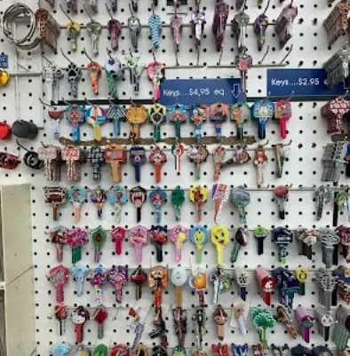 A wall of decorative patterned key blanks hanging at the Mount's counter